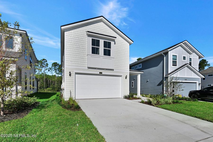 Exterior details and patio area of a home in Crosswinds at Nocatee, Ponte Vedra (Image 21).