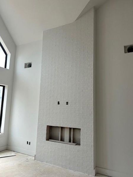 Stacked tile fireplace going in.