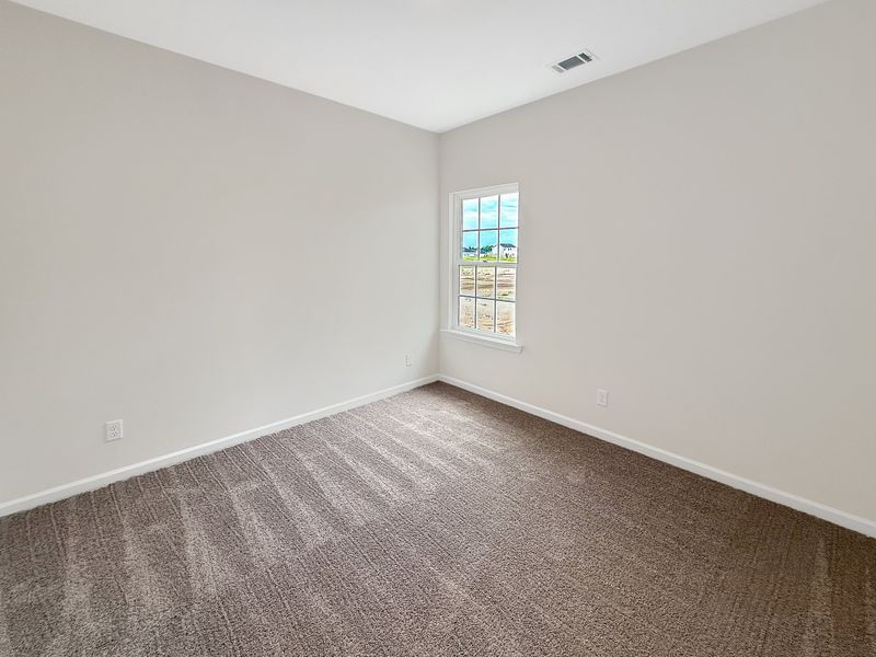 Spacious, unfurnished interior of a new home in The Village at Sassafras, Allenhurst (Image 19).