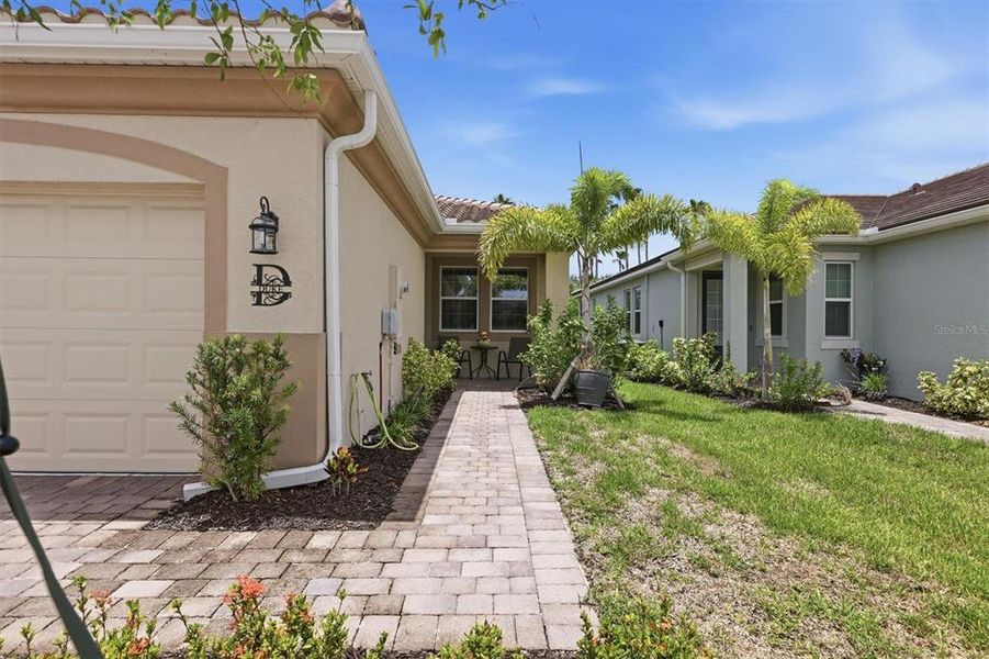 Exterior details and patio area of a home in Wellen Park, Venice (Image 21).