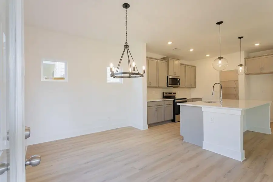 Furnished interior view inside a new home in , Buford (Image 7).