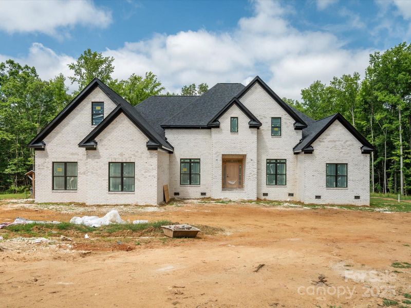 Front exterior of a new home in , Waxhaw, NC, highlighting curb appeal (Image 2).