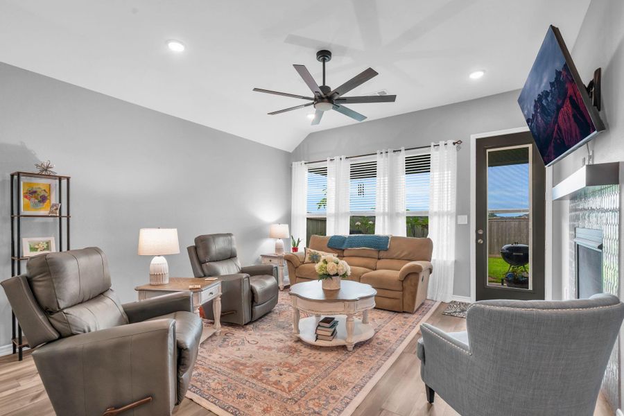 The main living area has great natural light, access to the back patio and recently upgraded ceiling fan. The main living area has great natural light, access to the back patio and recently upgraded ceiling fan.