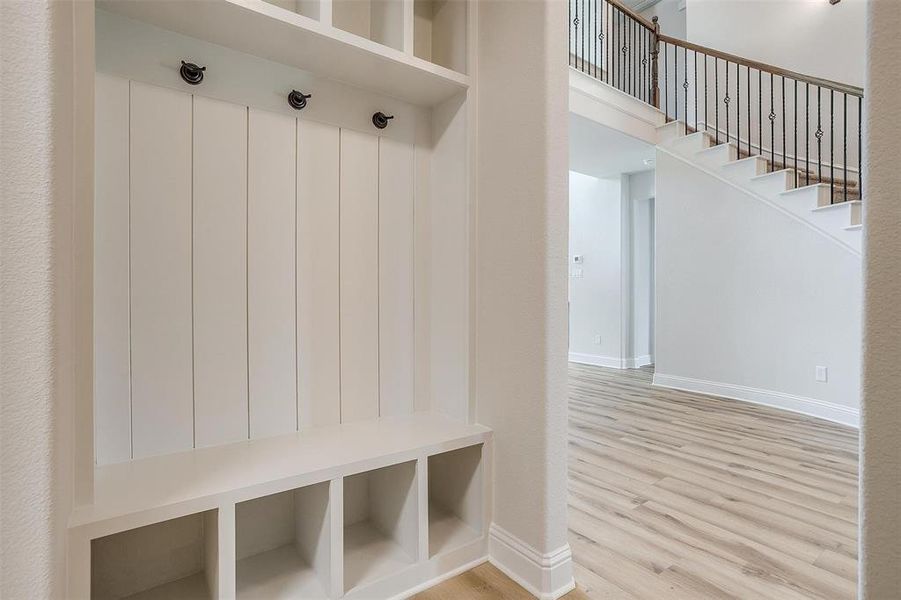 Mudroom featuring light wood-type flooring