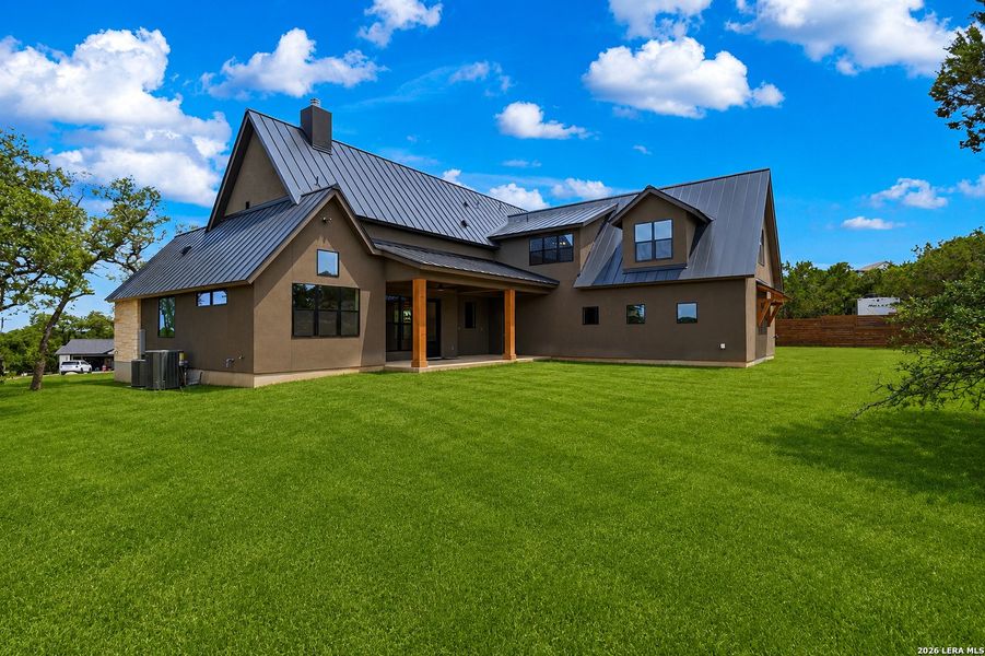 Exterior details and patio area of a home in , Spring Branch (Image 32).