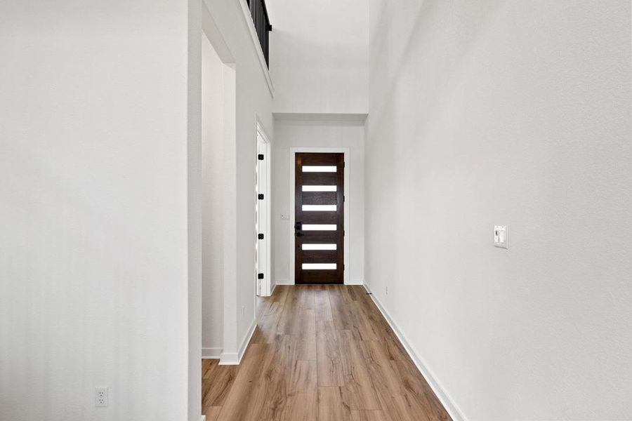 Spacious, unfurnished interior of a new home in Heritage, Dripping Springs (Image 39).