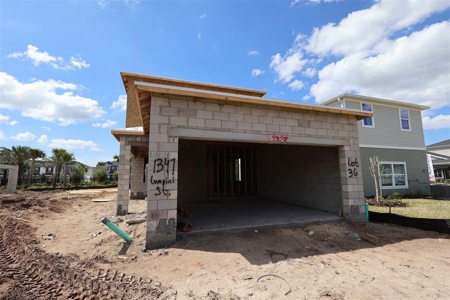 In-progress construction of a new home in Center Lake on the Park, St. Cloud, FL (Image 11).