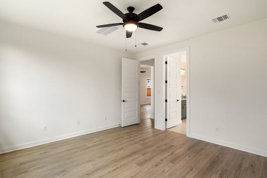 Spacious, unfurnished interior of a new home in Terrace Collection at Heritage, Dripping Springs (Image 35).