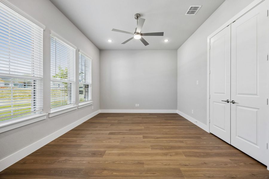 Spacious, unfurnished interior of a new home in Rainwater Crossing, Celina (Image 31).