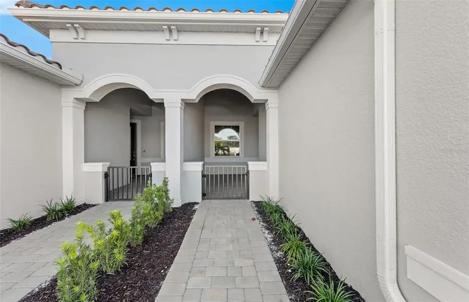 Exterior details and patio area of a home in Legacy Groves, Nokomis (Image 23). Exterior details and patio area of a home in Legacy Groves, Nokomis (Image 23).