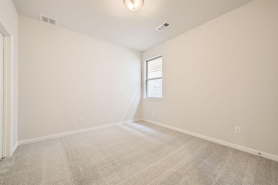 Unfurnished room featuring carpet floors