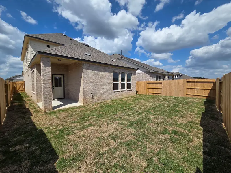 Exterior details and patio area of a home in Emory Glen, Magnolia (Image 4).