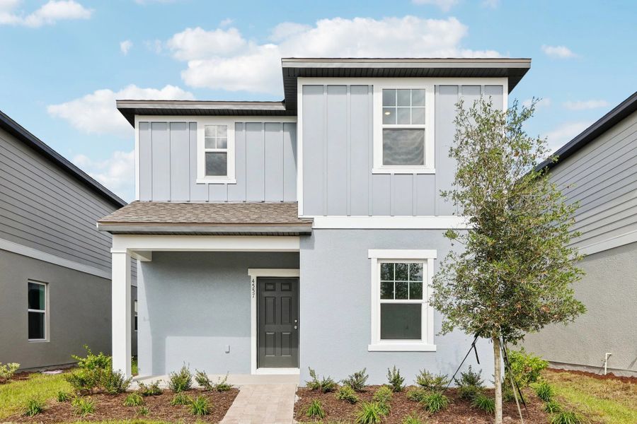 Representative exterior photo of a completed home built from the Lyon by Starlight Homes in Hawks Run, Kissimmee, FL (Image 1). Representative exterior photo of a completed home built from the Lyon by Starlight Homes in Hawks Run, Kissimmee, FL (Image 1).