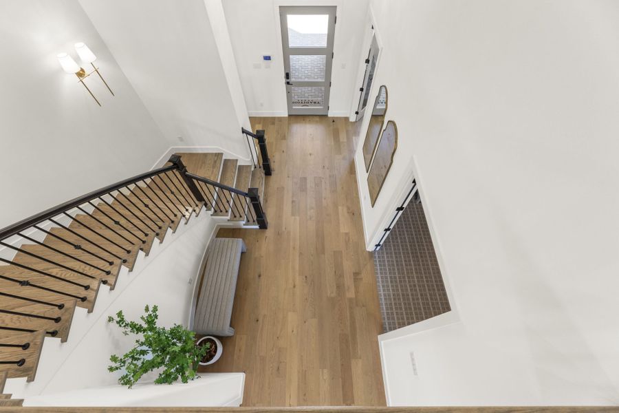 Representative furnished interior of a home built from the 6051 by Tradition Homes in StarView, Prosper (Image 5).