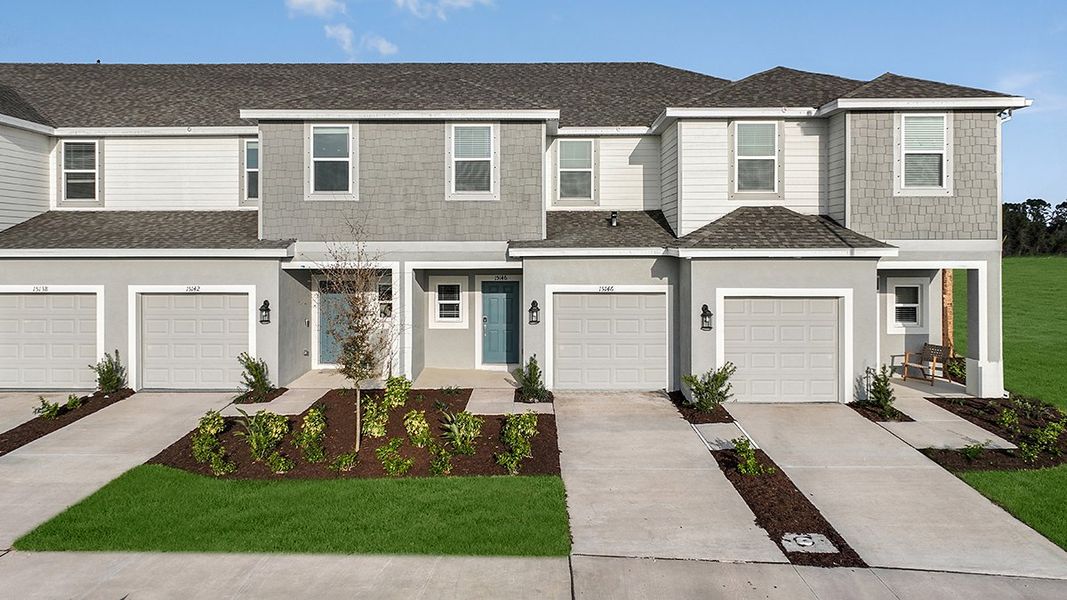 Front exterior of a home in the Vinterra Townhomes community, located in Nokomis, FL (Image 10).