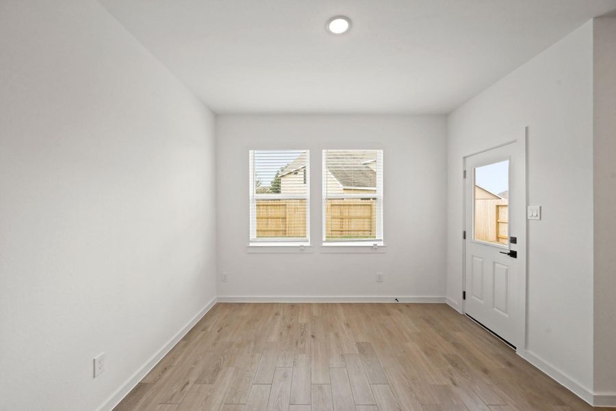 Sun-lit dining area Sun-lit dining area