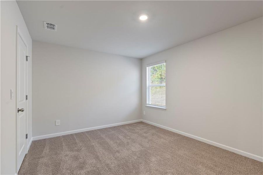 Spacious, unfurnished interior of a new home in Hamilton Crossing, Buford (Image 17).