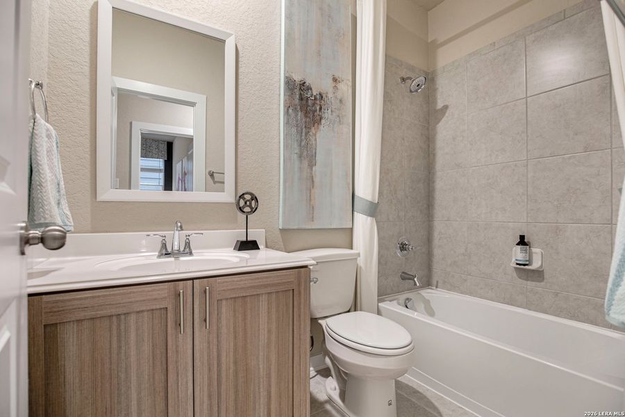 Furnished interior view inside a new home in Rose Hill, San Antonio (Image 16).