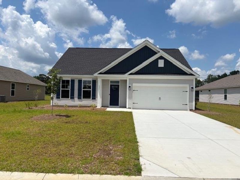 Front exterior of a new home in Briarfield, Conway, SC, highlighting curb appeal (Image 1). Front exterior of a new home in Briarfield, Conway, SC, highlighting curb appeal (Image 1).