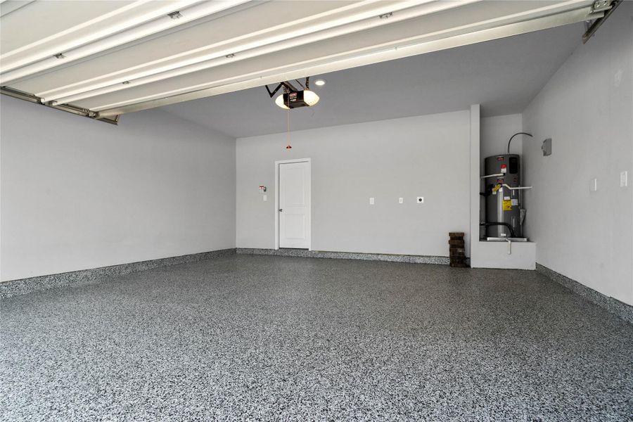 Experience the ultimate in utility with a seamless, industrial-grade concrete coating that resists stains, chemicals, and hot-tire peel. This low-maintenance, dust-free surface ensures your garage remains as impeccable as the rest of the home for years to come.
