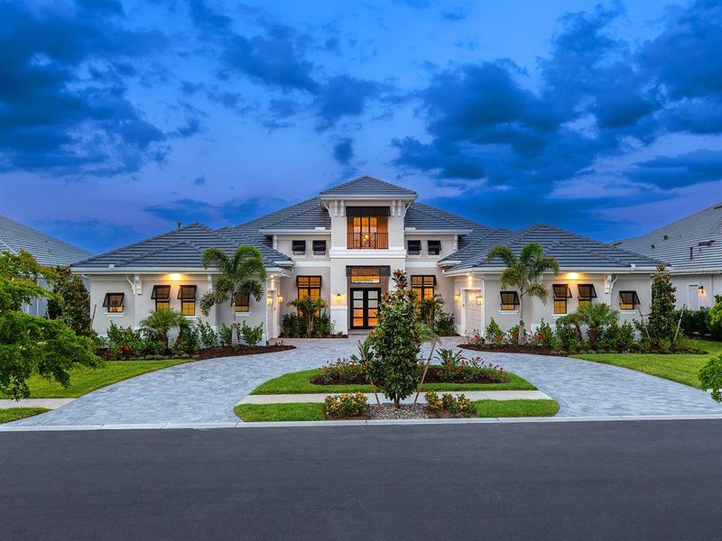 Front exterior of a new home in , Sarasota, FL, highlighting curb appeal (Image 26).