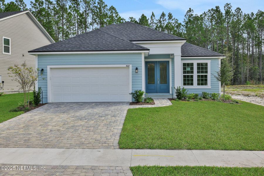 Front exterior of a new home in Brook Forest, St. Augustine, FL, highlighting curb appeal (Image 20).