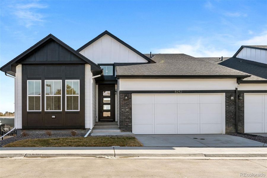 Front exterior of a new home in Deer Creek, Littleton, CO, highlighting curb appeal (Image 2).