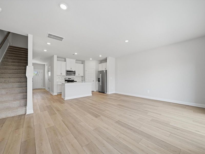Spacious, unfurnished interior of a new home in Crossing at Abner Creek Townes, Greer (Image 12).