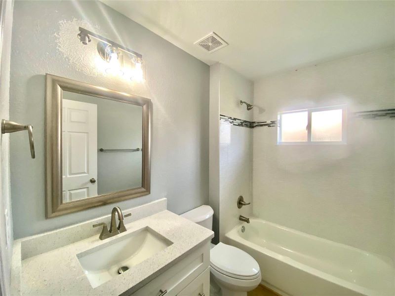 hall bath with tub/shower combo