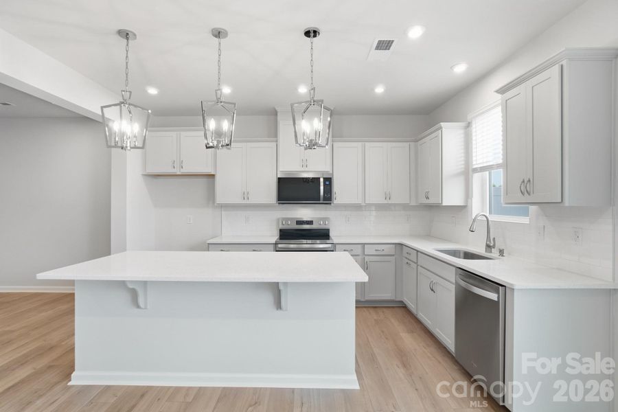 Furnished interior view inside a new home in Bailey Run, Charlotte (Image 8). Furnished interior view inside a new home in Bailey Run, Charlotte (Image 8).