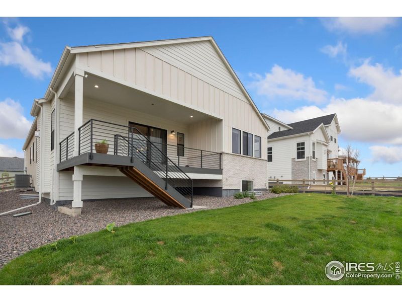 Front exterior of a new home in , Timnath, CO, highlighting curb appeal (Image 19).