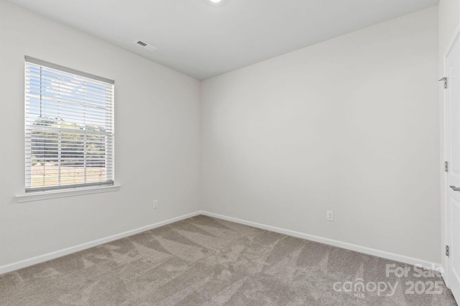 Spacious, unfurnished interior of a new home in Bell Farm: 60's, Statesville (Image 29).