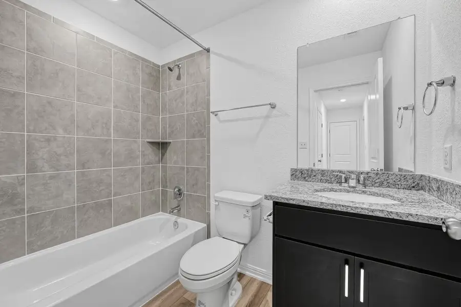 Furnished interior view inside a new home in Sunfield, Buda (Image 28).