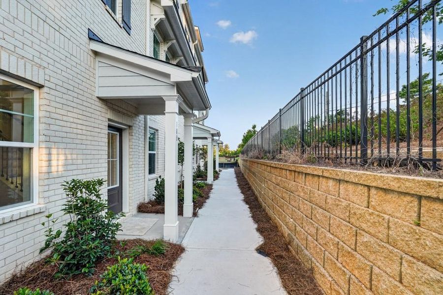 Exterior details and patio area of a home in Chandler Run, Tucker (Image 22).
