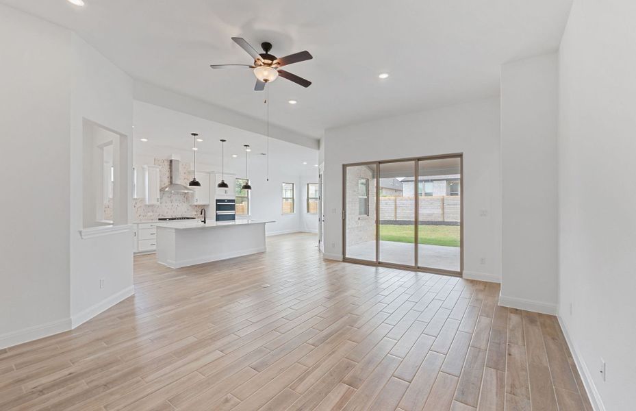 Spacious, unfurnished interior of a new home in Bluffview Reserve, Leander (Image 56).