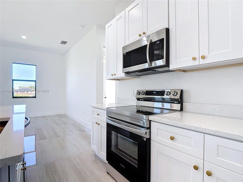 Furnished interior view inside a new home in , Lehigh Acres (Image 11). Furnished interior view inside a new home in , Lehigh Acres (Image 11).