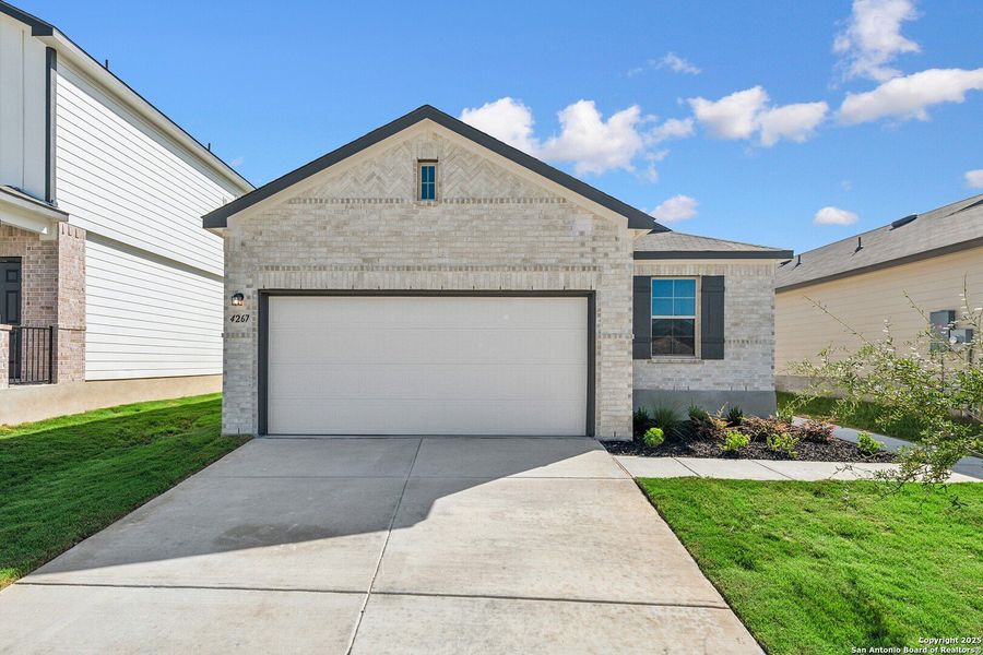 Front exterior of a new home in Park Place, New Braunfels, TX, highlighting curb appeal (Image 19).