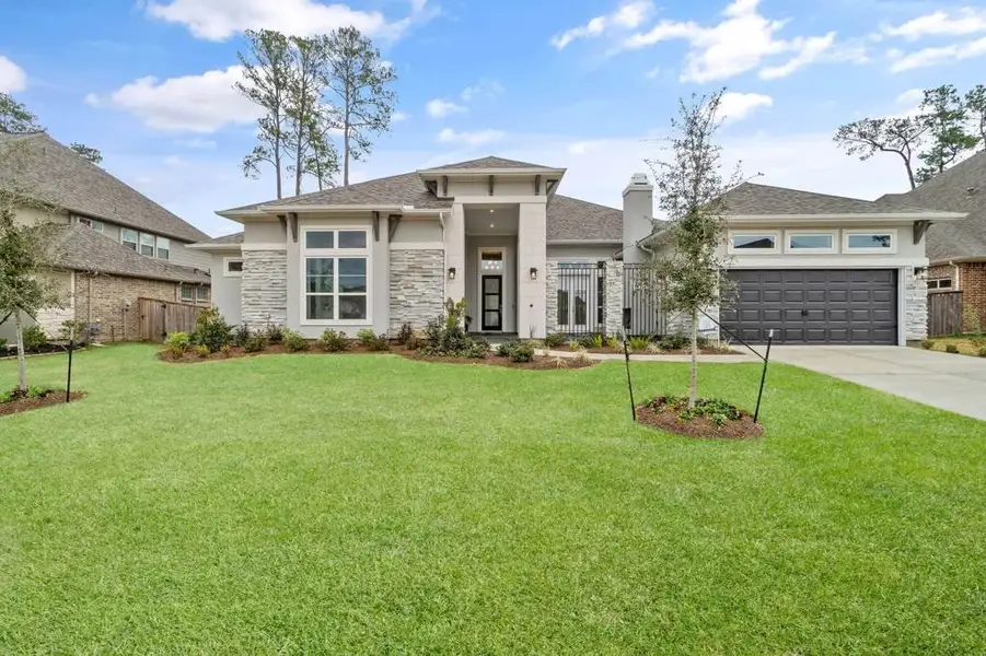 Front exterior of a home in the Jubilee 80′ Lots community, located in Hockley, TX (Image 9).