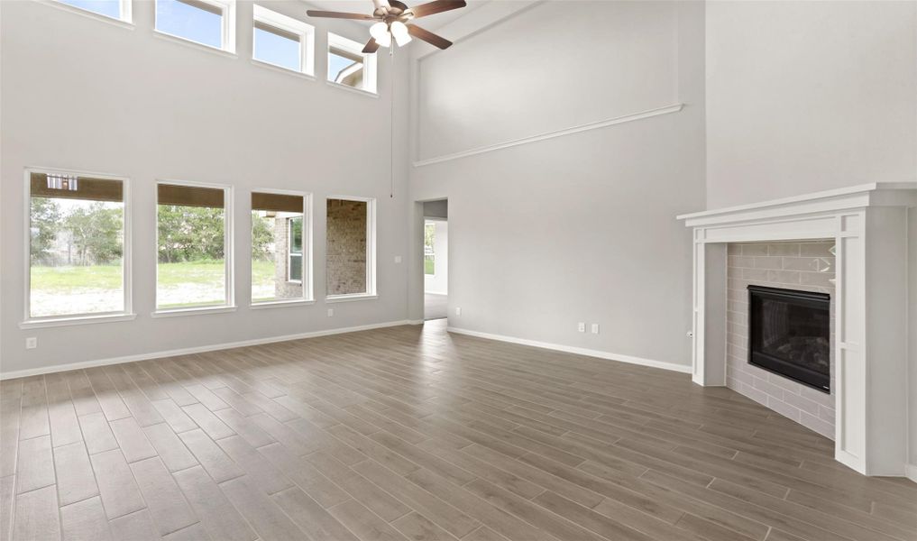 Impressive great room with fireplace (*Photo not of actual home and used for illustration purposes only.) Impressive great room with fireplace (*Photo not of actual home and used for illustration purposes only.)