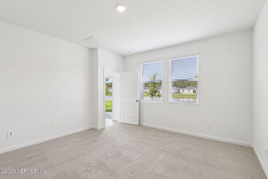 Spacious, unfurnished interior of a new home in Cypress Meadows - Classic Series, Jacksonville (Image 26).
