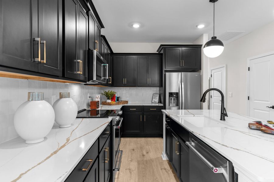 Representative furnished interior of a home built from the Turlington by McKee Homes in Pembroke, Hope Mills (Image 5).