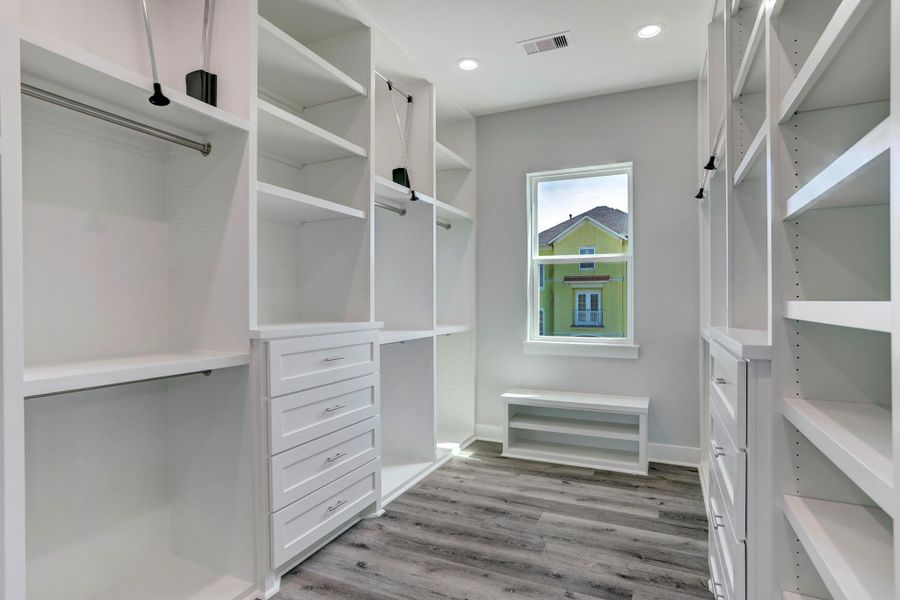 Primary closet with multiple built ins, pull down racks and great storage. Primary closet with multiple built ins, pull down racks and great storage.