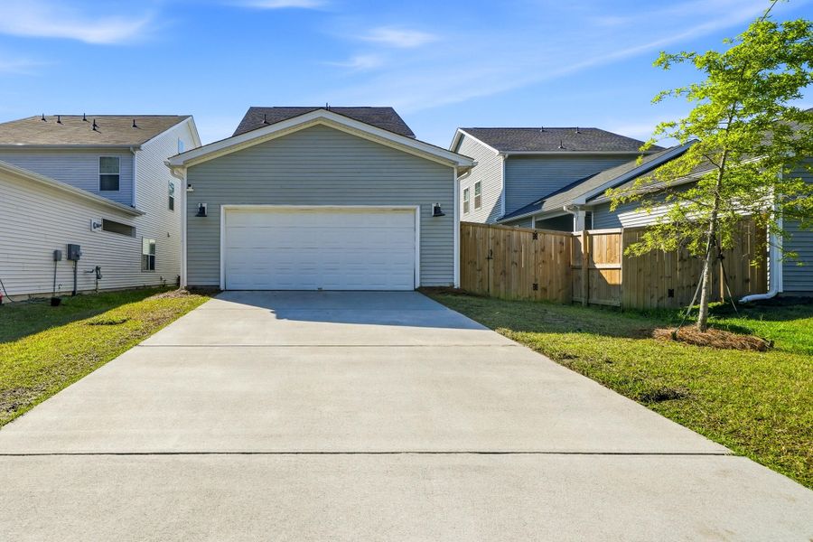 Front exterior of a new home in Six Oaks, Summerville, SC, highlighting curb appeal (Image 25).
