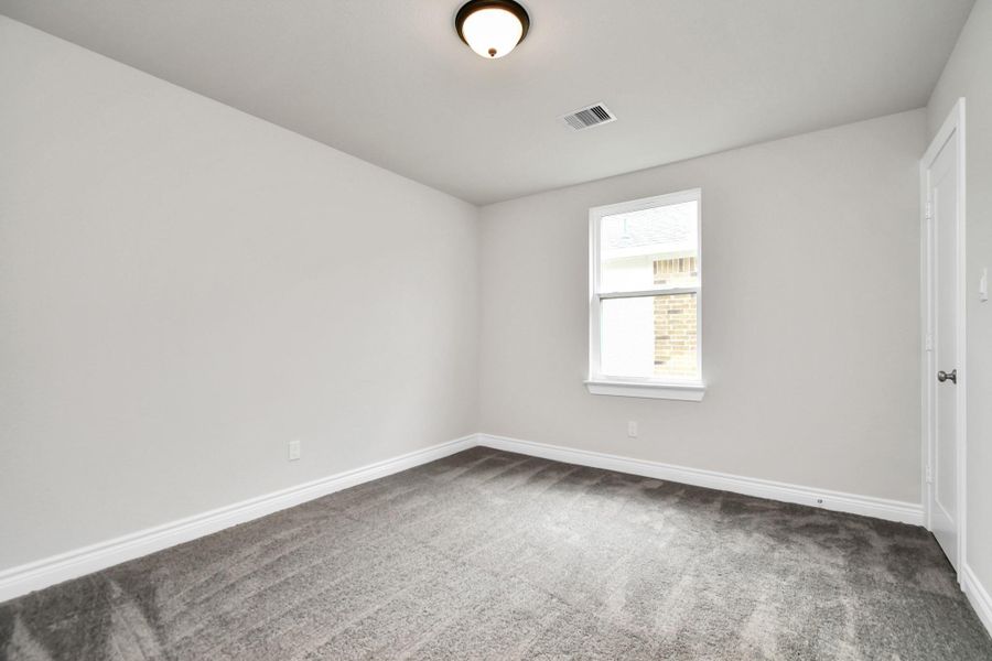 Spacious, unfurnished interior of a new home in Hill & Dale Ranch, Splendora (Image 8).