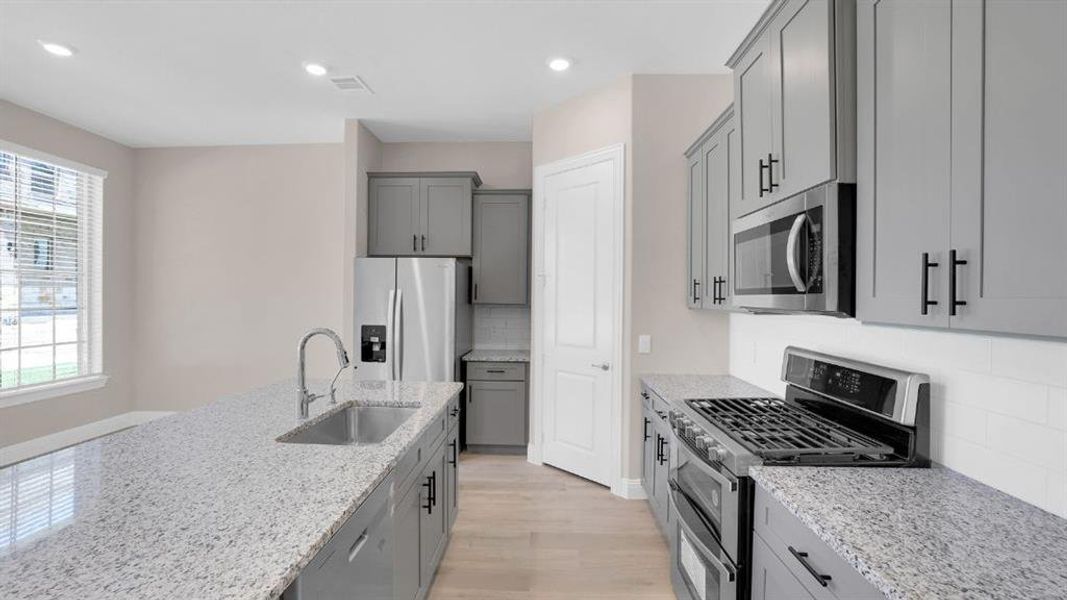 Furnished interior view inside a new home in Mustang Square, Plano (Image 3). Furnished interior view inside a new home in Mustang Square, Plano (Image 3).
