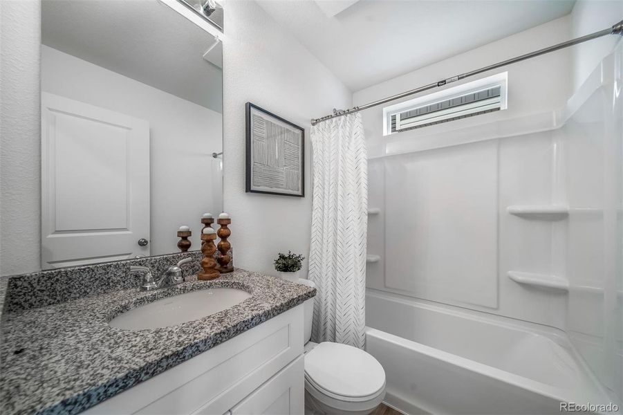 Furnished interior view inside a new home in Reunion, Commerce City (Image 12).
