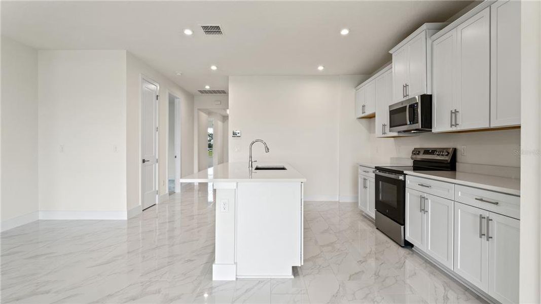 Furnished interior view inside a new home in Trailside, Mount Dora (Image 5).