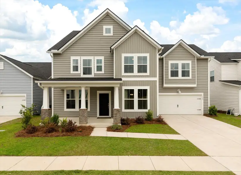 Front exterior of a new home in Sweetgrass at Summers Corner, Summerville, SC, highlighting curb appeal (Image 26).