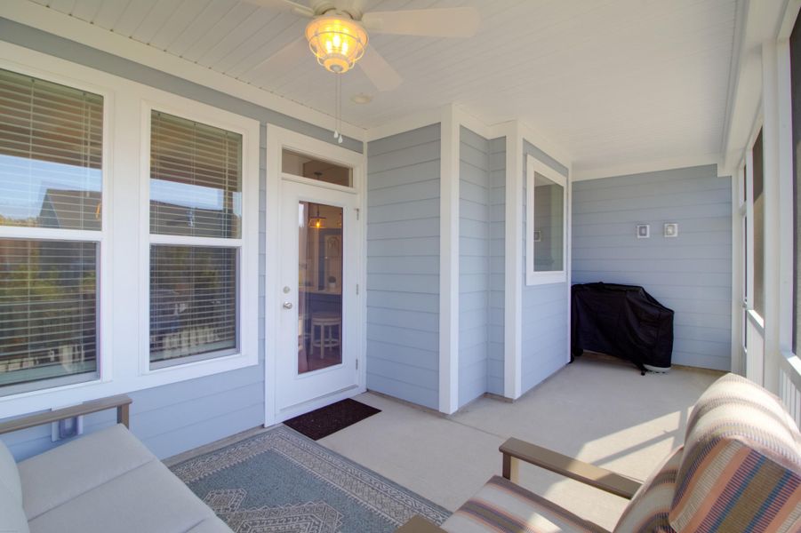 Exterior details and patio area of a home in Cresswind Charleston, Summerville (Image 25).