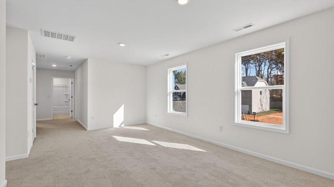 Representative unfurnished interior of a home built from the Hartwell by D.R. Horton in The Estates Park, Apex (Image 19).